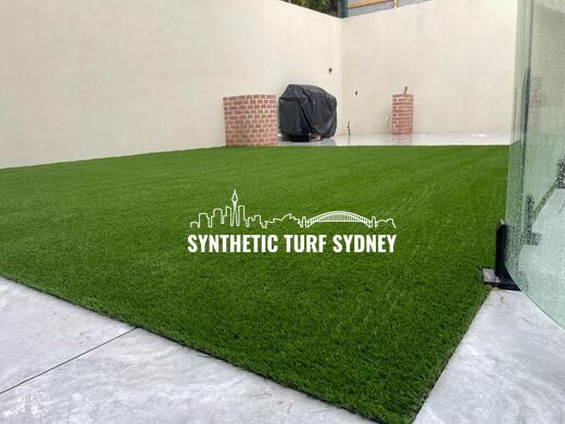 Synthetic lawn installed in a residential backyard