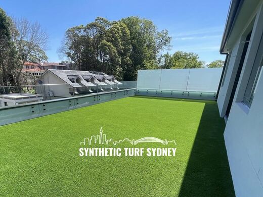 Synthetic lawn installed in a residential backyard