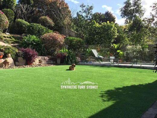 Synthetic lawn installed in a residential backyard