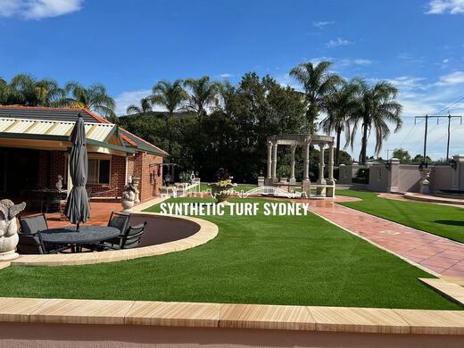 Synthetic lawn installed in a residential backyard