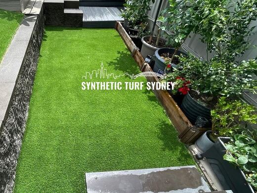 Synthetic lawn installed in a residential backyard