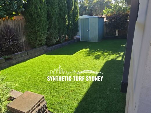 Synthetic lawn installed in a residential backyard