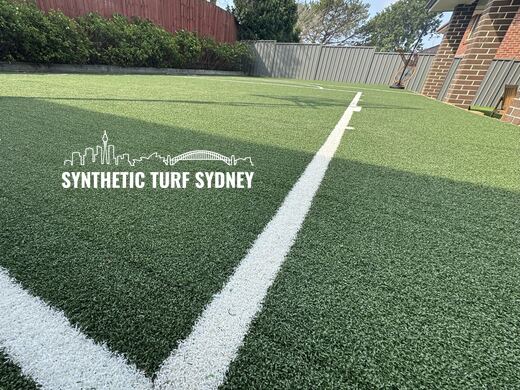 Synthetic turf basketball court installation