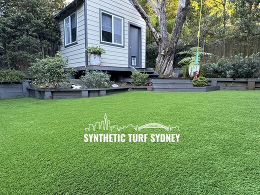 Synthetic lawn installed in a residential backyard