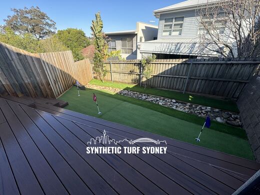 Putting green beside a timber deck, laid in STS Putting Turf synthetic turf