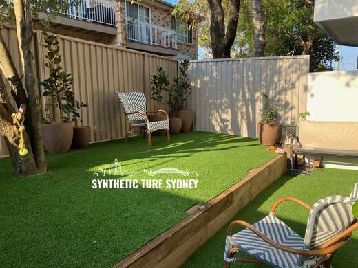 Courtyard lawn behind a sleeper edge, laid in Collaroy 40mm synthetic turf