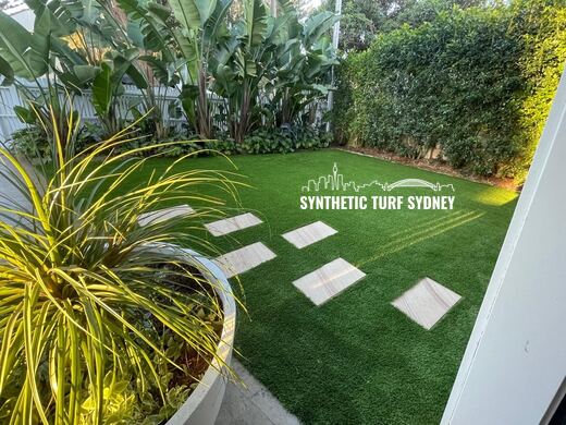 Stepping pads across a shaded lawn, laid in Collaroy 40mm synthetic turf