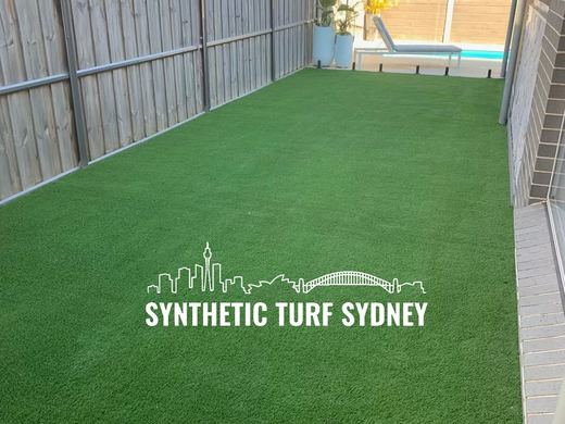 Synthetic lawn installed in a residential backyard