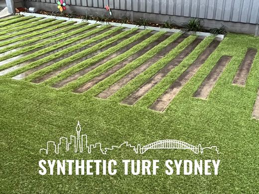 Synthetic lawn installed in a residential backyard
