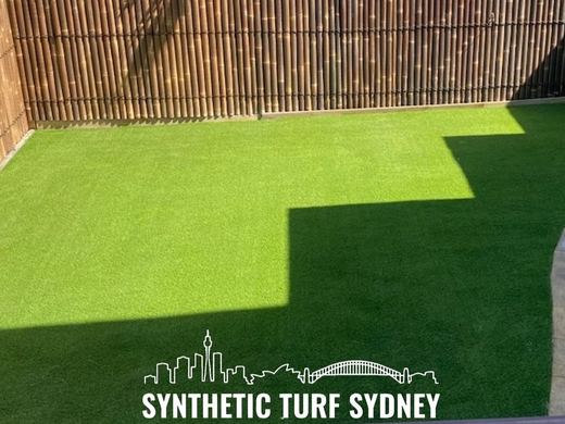 Synthetic lawn installed in a residential backyard