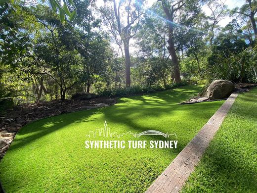 Synthetic lawn installed in a residential backyard