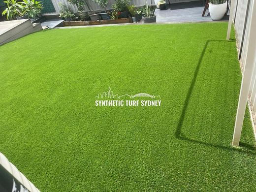 Synthetic lawn installed in a residential backyard