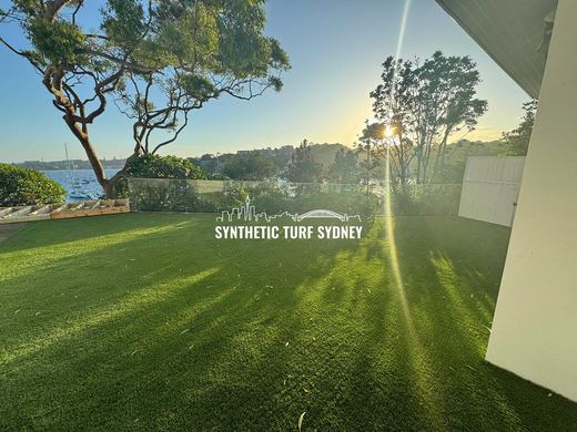 Synthetic lawn installed in a residential backyard