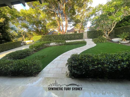 Synthetic lawn installed in a residential backyard