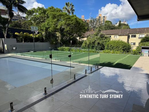 Synthetic turf basketball court installation
