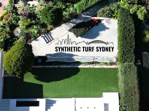 Synthetic lawn installed in a residential backyard
