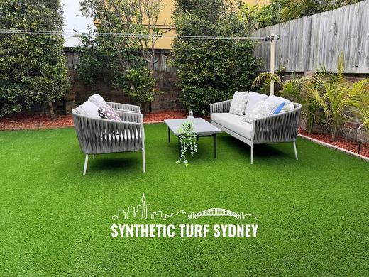 Synthetic lawn installed in a residential backyard