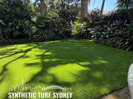 Synthetic lawn installed in a residential backyard