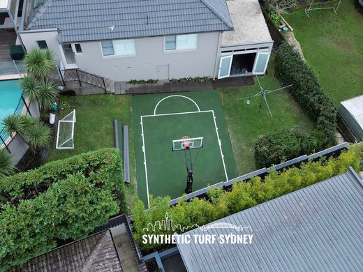 Synthetic turf basketball court installation