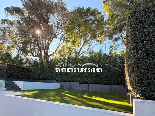 Synthetic lawn installed in a residential backyard