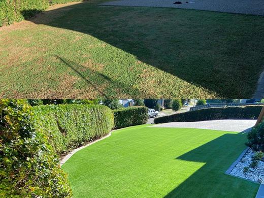 Synthetic lawn installed in a residential backyard