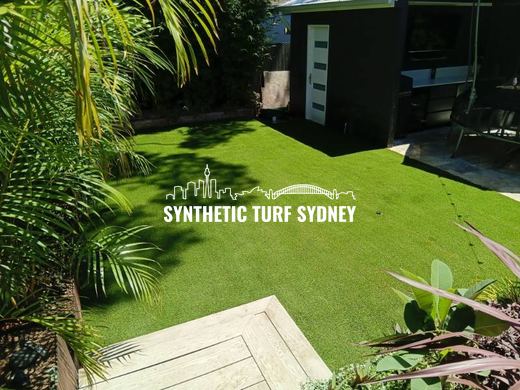 Synthetic lawn installed in a residential backyard