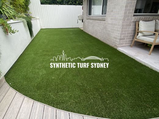 Synthetic lawn installed in a residential backyard