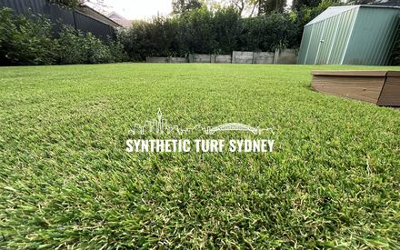 Wide lawn to raised deck, laid in Hyde Park 40mm synthetic turf