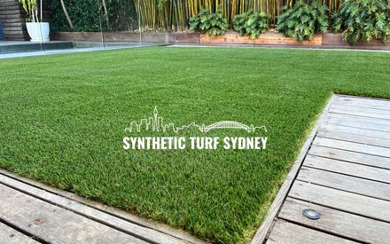 Lawn to timber deck edge, laid in Hyde Park 40mm synthetic turf