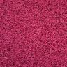 Pink coloured synthetic turf, close up of the pile