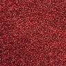 Red coloured synthetic turf, close up of the pile